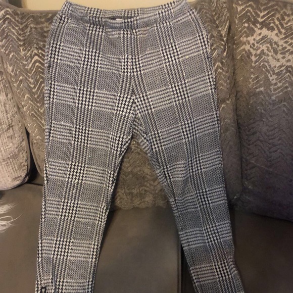 Black and white Checkered pants with zippers on the side of pants legs. - Picture 1 of 5